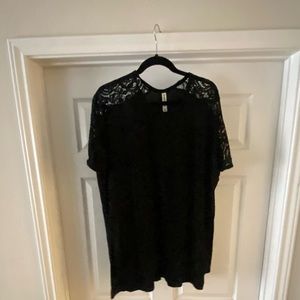 Brand new! Black lace sleeve top.